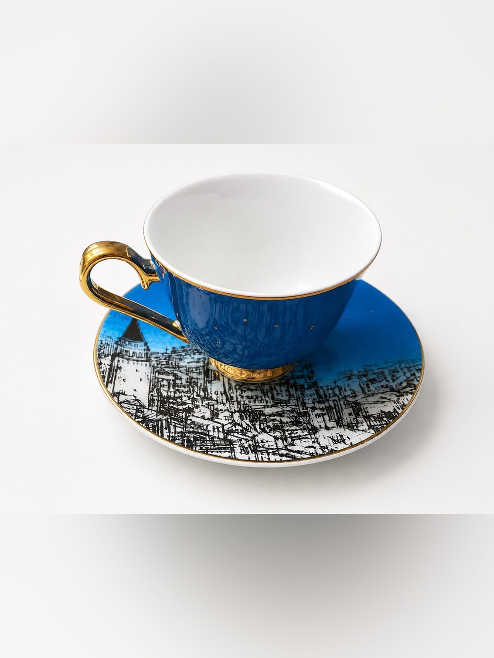 Royal Blue Porcelain Teacup and Saucer with Gold Trim